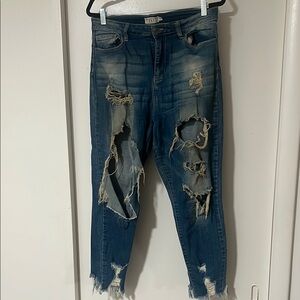 Ultra Distressed Blue Jeans